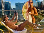 Christine McGuinness poses topless as she sleeps on the balcony of a London apartment and says ‘it was happy hour from sunrise to sunset’
