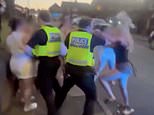 Police probe video showing officers attacking group of young girls with baton and Tasers as fight breaks out on Rotherham street