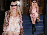 Madonna, 67, struts her stuff in lace silk nightwear and knee-high boots as she turns heads at Men’s Paris Fashion Week