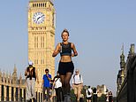 Heatwave Britain braces for 40C ‘hottest ever day’: Rare red ‘extreme heat’ warning comes into force as nearly 1,000 schools close – while train passengers are forced to walk on the tracks amid travel chaos