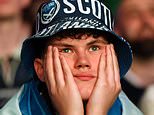 Agony for the Tartan Army: Scotland fans commiserate desperate World Cup defeat by Brazil – now, their US adventure hangs in the balance