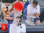 Amanda Holden tips a bucket of ice over co-host Jamie Theakston’s head as they attempt to cool down in the baking heatwave