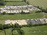 The Home Counties village where ‘travellers outnumber locals’: Families in 20 caravans expand illegal camp as they bulldoze another field in weekend land grab
