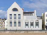 Wish you weren’t here! Pink Floyd’s Dave Gilmour cuts price of seafront home in half to £8.25m after battle with campaigners over his rebuild