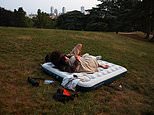 Parisians take to sleeping outside as heatwave sweeps Europe: Nearly 200million face 35C today as ‘heat dome’ is set to smash more records in Germany and Poland