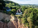 Don’t look down! Stunning three-bed home perched on the edge of a cliff is on the market for £250,000