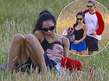 Harry Styles rests his head on Zoe Kravitz’s lap as couple enjoy a PDA-packed picnic on Hampstead Heath