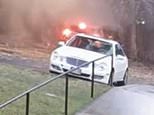 Moment woman, 54, is struck by LIGHTNING outside her Catholic church by bolt so strong it made tree explode
