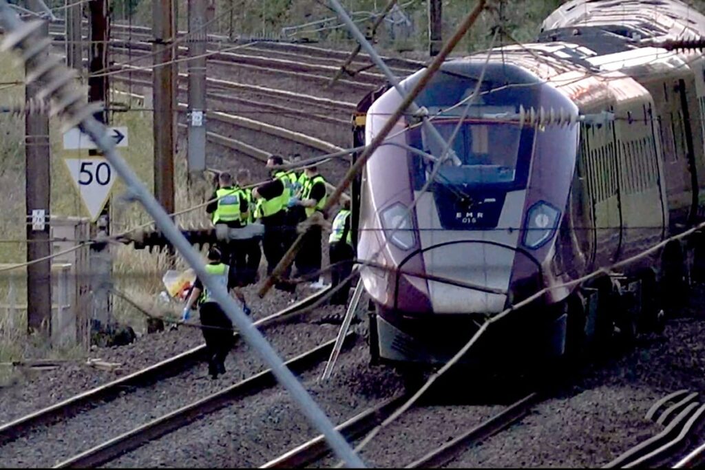 One dead and dozens seriously injured as two trains collide near Bedford