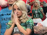Megan Pickford’s iconic match moments! WAG coordinates her £7k Chanel handbag to her cropped football shirt as she prays, fans herself and touches up her lippy during England game