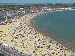 Brits are bracing for another heatwave as Met Office warns of 35C temperatures – as forecasters issue yellow weather warning for RAIN
