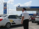 Guards are brought in to keep order as huge queues form at Russian petrol stations following wave of successful Ukrainian attacks on refineries