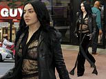 Charli XCX turns heads as she flashes her bra in a sheer lace top while leaving her album listening party in New York City