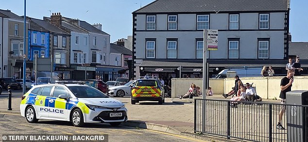 Clevland Police at Seaton Carew Beach in County Durham, where two men died trying to rescue children in the water