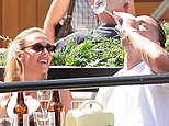 Jack Grealish slumps over a bar table as he downs champagne and splashes out on vodka on a boozy day out with female friends – while his old England team-mates prepare for historic World Cup semi-final