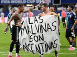 Argentina stars face nervous wait over potential ban for holding up ‘Malvinas’ banner after win over England as FIFA reveal they will ‘decide further steps’