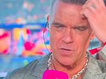 We all saw a mystery white lump fall on Robbie Williams’ mic at the World Cup. He’s given a cheeky explanation, but to me it’s not a good look: LIZ JONES
