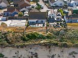 The community lost to the sea: Empty plots of land on Britain’s most eroded coastline go on sale for up to £8,000 – as pensioners are told to sell their homes or pay to demolish them