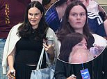 Pregnant Holly Ramsay takes a seat in the stands to watch husband Adam compete in the 100m breaststroke at the Commonwealth Games as he bags a place in the final