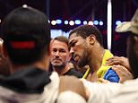 Anthony Joshua fights back tears as he dedicates dramatic victory over Kristian Prenga to two best friends killed in car crash as he recovers from TWO knockdowns to win on return