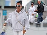 Katie Price continues to stick by conman husband Lee Andrews as she’s seen with her wedding ring on after he was released from Dubai prison