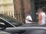 Horrific moment man in his 30s is stabbed in front of crowd during afternoon in busy Soho street