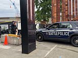 Three dead and four injured including 2-year-old boy in mass shooting near iconic Space Needle in Seattle as terrifying video shows panicked festivalgoers fleeing for their lives