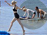 Skipping to the seaside! Anya Taylor-Joy sports a black bikini and buttoned shirt as she enjoys paddleboarding with her husband Malcolm McRae