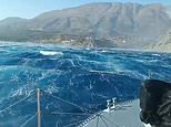 Greek fishermen join mission to save tourists from Crete beaches as thousands flee wildfires and infernos rage on multiple holiday islands