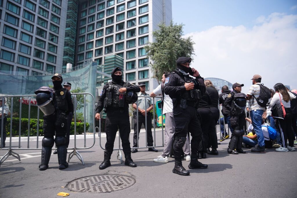 100 riot police guard England hotel as team receive hostile reception in Mexico