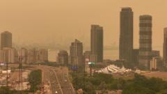 Orange haze from Canada wildfires seen in Ontario and northern US