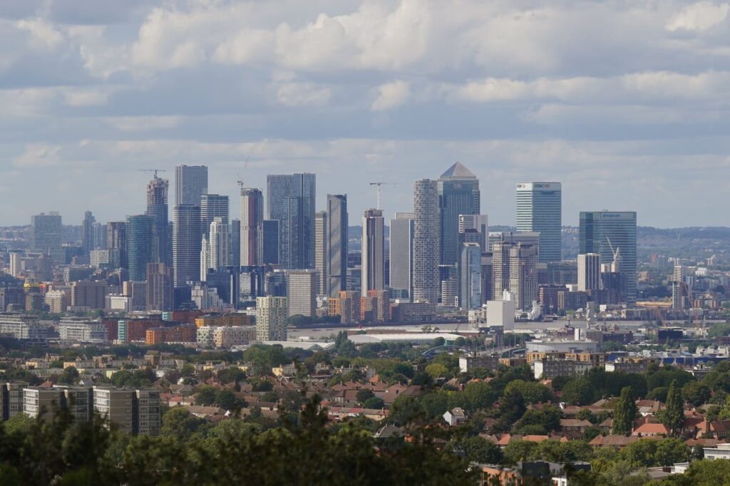 FTSE 100 closes just below milestone after strong week