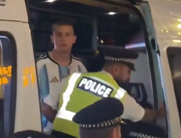 Moment Met Police rescue Argentina fan from crowd in central London
