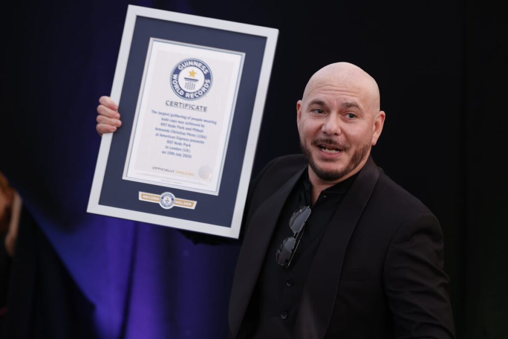 Mr World Record: Pitbull recognised for largest gathering of people in bald caps