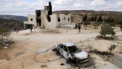 Israeli settlers attack West Bank village and block Palestinian family’s return home