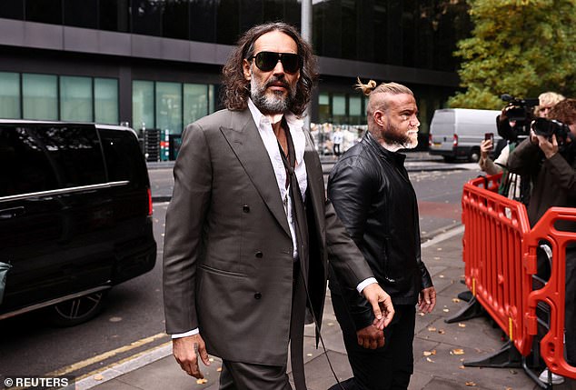 British actor and comedian Russell Brand arrives at Southwark Crown Court where he stands trial on charges of rape and sexual assault involving six women between 1999 and 2009, which he denies, in London, Britain, October 13, 2026. REUTERS/Jack Taylor