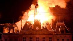 Violent clashes, looting and buildings ablaze in France as over 1,000 arrested after protests
