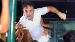 India’s opposition leader dragged on to bus as police break up protest
